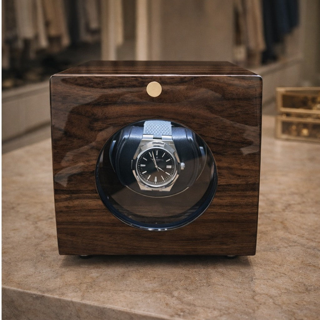 Single-slot automatic watch winder in polished dark wood with glass viewing window, luxury rotation storage for mechanical watches